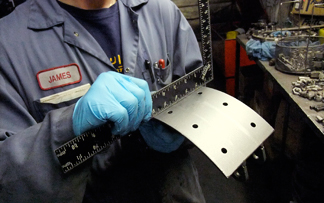 relining and riveting a brake shoe